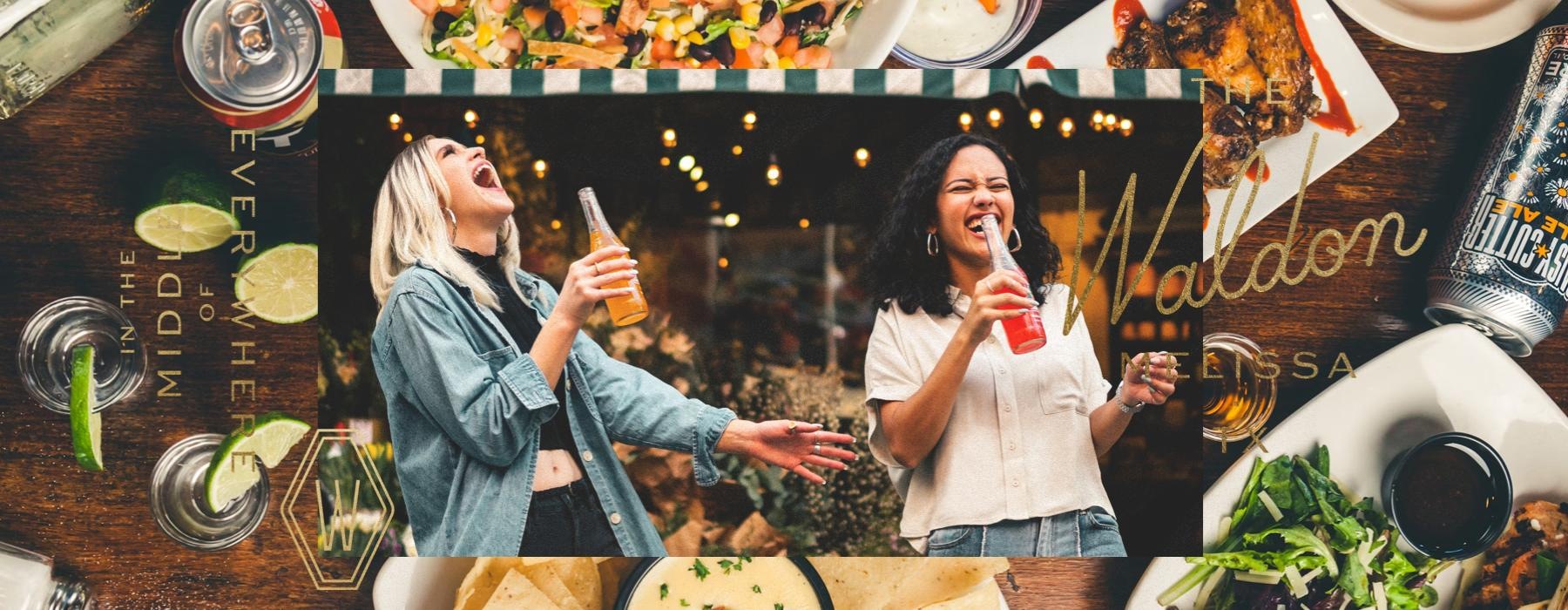 a couple of women drinking beer